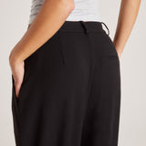 Loose-Fitting Trousers with Pleats and Pockets