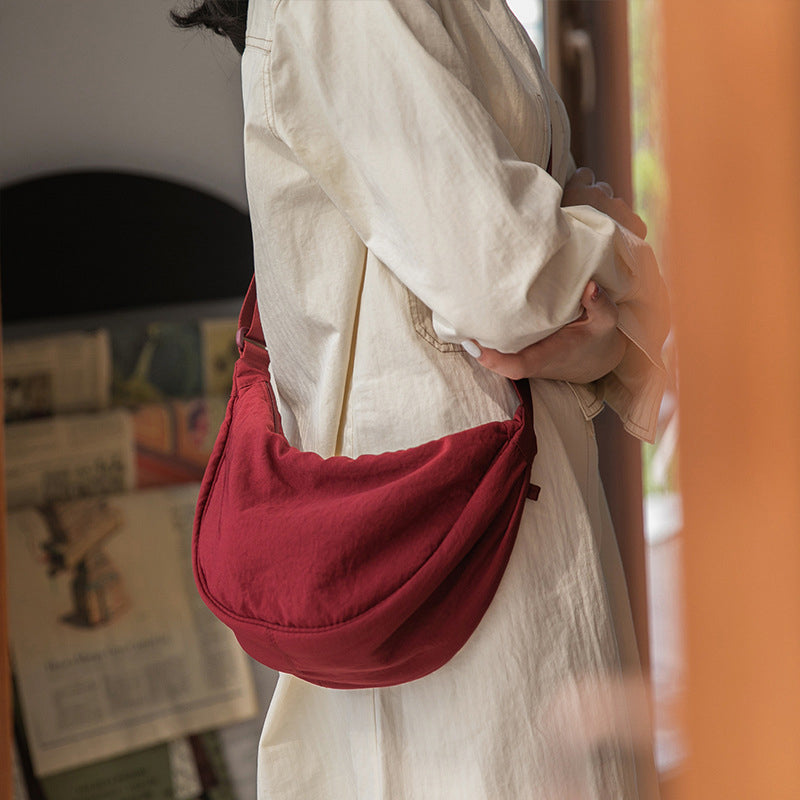 LunaCross - Organize and Transport with Style with this Half-Moon Shoulder Bag