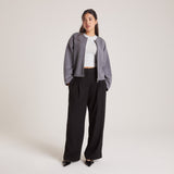 Loose-Fitting Trousers with Pleats and Pockets